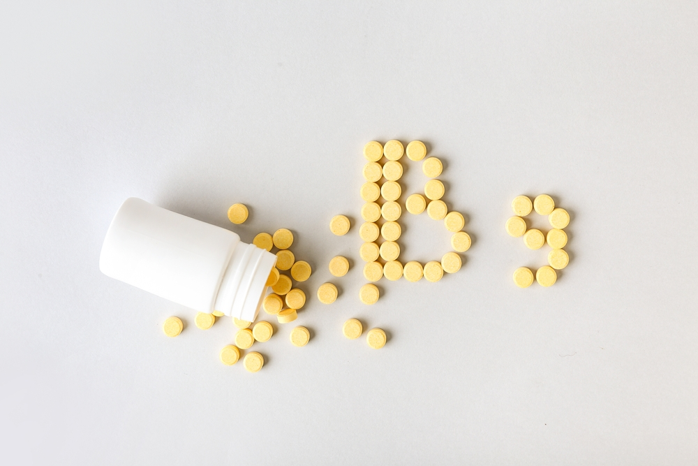 folic acid pills spelling out B9